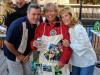 Randy & Lisa w/ b’day boy Tommy sporting his photo-covered aprons. photo by Larry Testerman